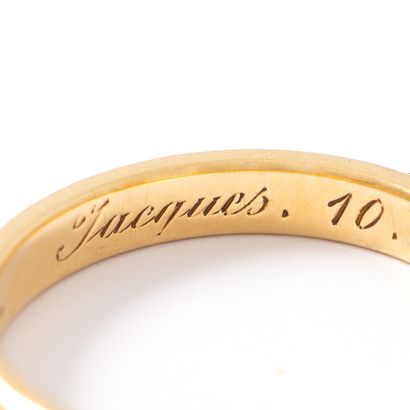 null 18K yellow and white gold 750‰ wedding band with interior engraving. Dated 1955.

Slight...