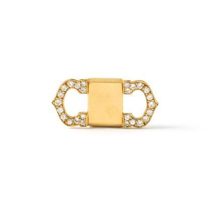 null Cartier (attributed to). 18K yellow gold 750‰ motif set with round diamonds.

Bears...