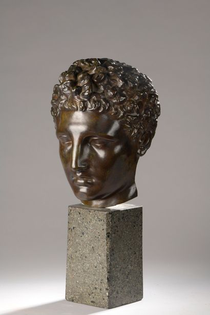 null School of the XXth century 

Head after the antique 

Bronze with plum patina....