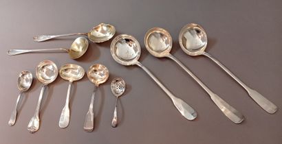 null 
Lot including:

- Three silver ladles 1st title 950‰, plain pattern.

- Three...