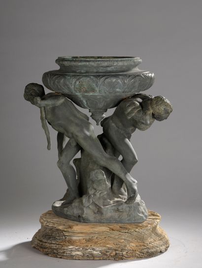 Bronze planter formed by a basin supported...