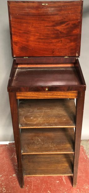 null Mahogany and mahogany veneer standing writing desk opening with a flap covered...