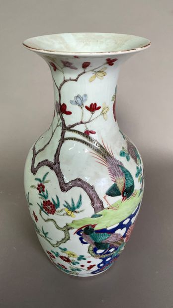 null Porcelain baluster vase decorated with rock, flowers, pheasants and peonies.

China...