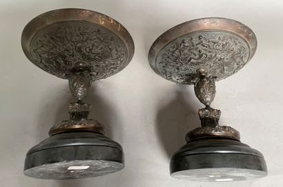 null Pair of bronze cups on foot with brown patina decorated with mythological scenes,...