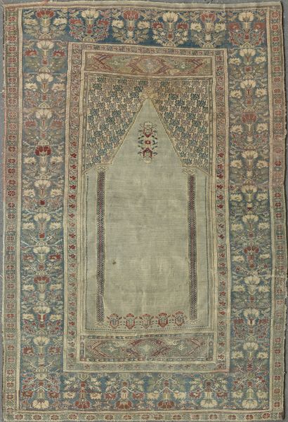 null Prayer rug with columned mihrab and lamps, Ghiordes, Turkey

Large border of...