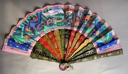 null Lot including : 

- Polychrome and gilded bamboo fan, the leaf decorated with...