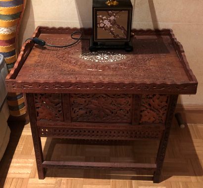 null Set including :

- A pedestal table in carved wood and mother of pearl inlay.

Syrian...