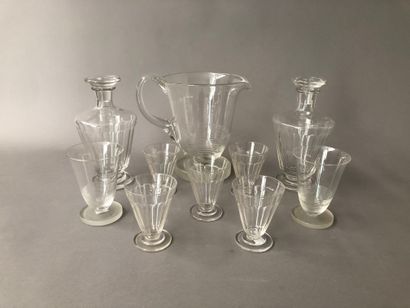 null Lot in crystal and glass including :

- A pitcher decorated with a frieze of...