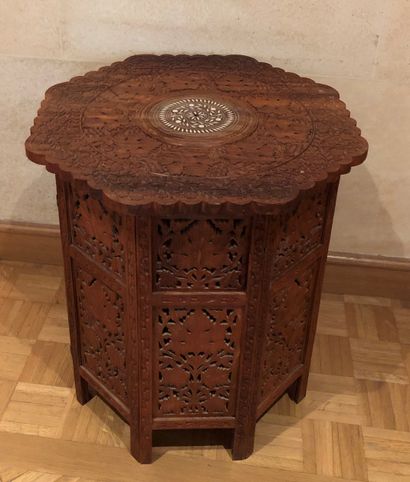 null Set including :

- A pedestal table in carved wood and mother of pearl inlay.

Syrian...