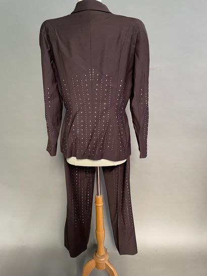 null Lot including : 

Thierry MUGLER Couture

- Silver wool and silk skirt suit,...