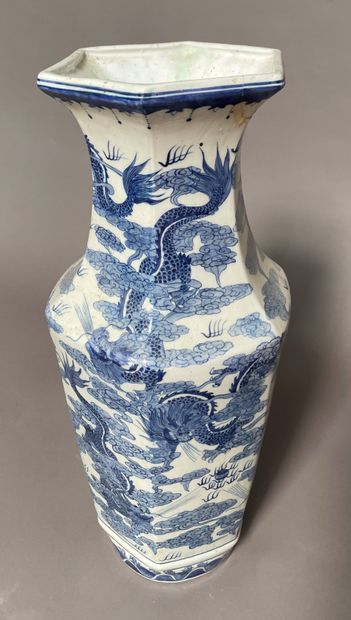 null Hexagonal porcelain vase decorated in blue with dragons among clouds.

China...
