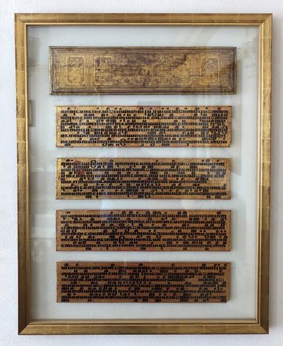 null 
Four framed pieces containing Burmese prayer books




105 x 82.5 cm each with...