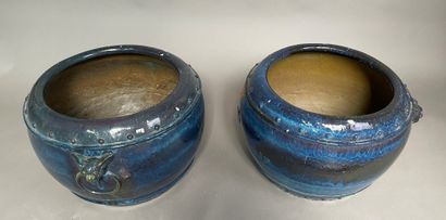 null Pair of stoneware fishbowls with midnight blue glaze, decorated with imitation...
