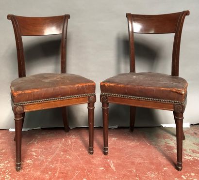 null Voltaire armchair in mahogany with light wood inlays decorated with scrolls...