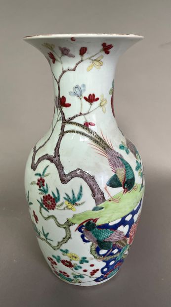 null Porcelain baluster vase decorated with rock, flowers, pheasants and peonies.

China...