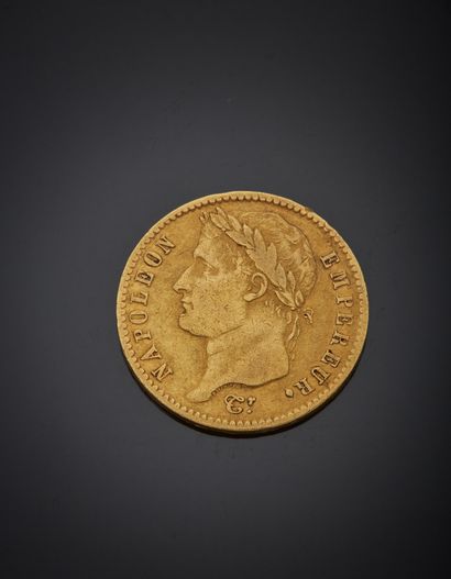 null Pièce de 20 francs or Napoléon Ier, tête laurée, datée 1810.

Poids 6,40 g