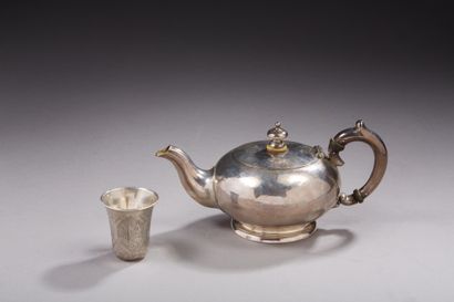 null Teapot in silver 84 zolotnik posing on a bottom of round form, the plain body,...