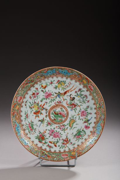 null Porcelain dish decorated with polychrome enamels and gold flowers, birds, butterflies...