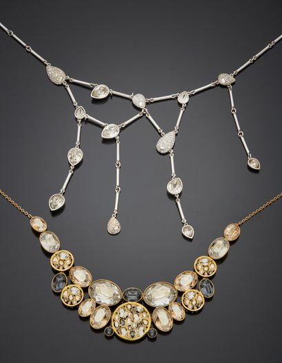 null SWAROSKI - Two necklaces, one in gilded metal adorned with yellow oval and pear-shaped...