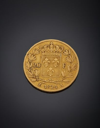null Pièce de 20 francs or Louis XVIII, tête nue, datée 1824. 

Poids 6,10 g