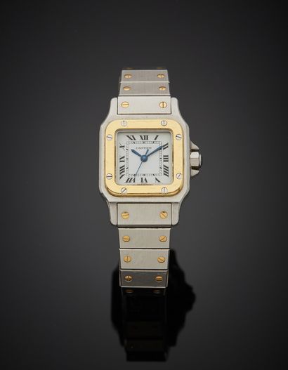 null CARTIER - Steel and 18K yellow gold 750‰ ladies' wristwatch, SANTOS model, square...