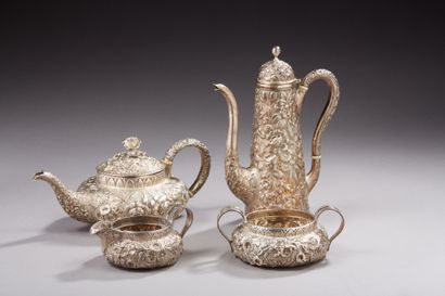 null Silver tea and coffee service 2nd title 800‰, chased au naturel with leaves...