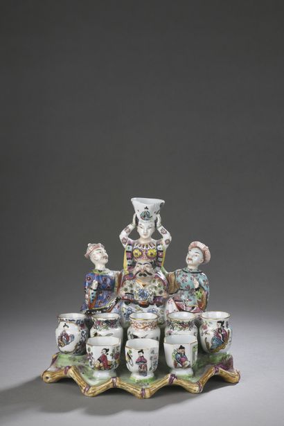 null PARIS

CHINESE POT-HOLDER, composed of a woman seated astride a seated Chinese...