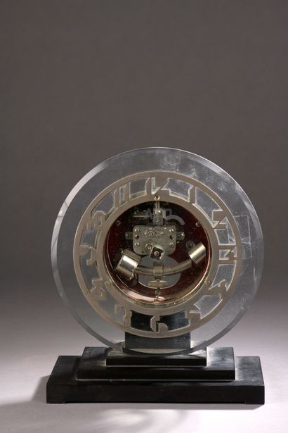 null Léon HATOT (1883-1953)-ATO

Table clock with a circular body in beveled white...