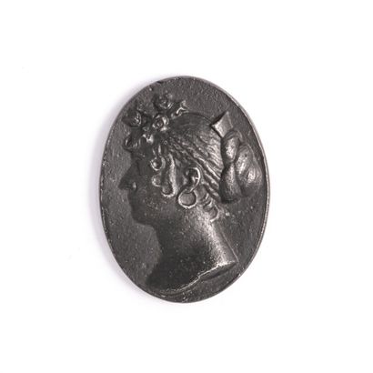 null Lot comprising six blackened metal casts, reproductions of cameos or intaglios,...