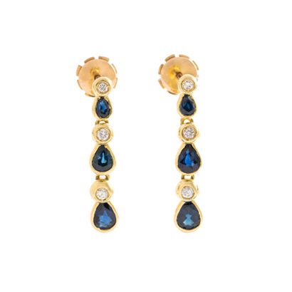 null Pair of 18K yellow gold 750‰ hinged earrings set with a drop of pear-cut sapphires...