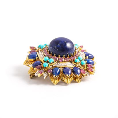 null Broche en or deux tons 14K 585‰, de forme ronde, sertie de lapis lazuli (traités),...