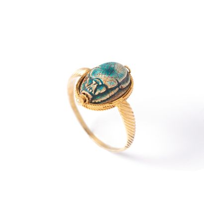 null 14K yellow gold 585‰ and silver 2nd title 800‰ ring, adorned with a frit beetle.

Transformations...