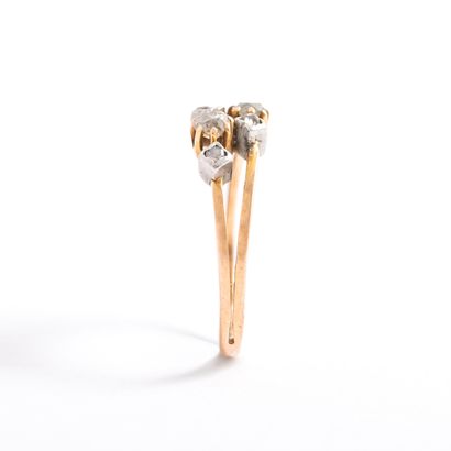 null 18K yellow gold 750‰ and platinum 800‰ ring, set with two old-cut diamonds and...