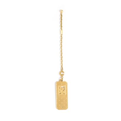 null Keychain in 18K yellow gold 750‰, adorned with a rectangular-shaped plate featuring...
