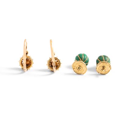 null Lot including:

- A pair of 18K yellow gold 750‰ sleepers, adorned at their...