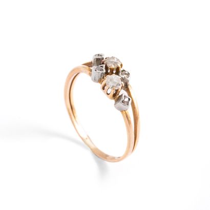 null 18K yellow gold 750‰ and platinum 800‰ ring, set with two old-cut diamonds and...