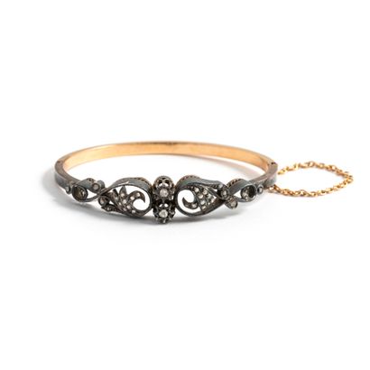 null 18K yellow gold 750‰ and silver 2nd title 800‰ bracelet, adorned with an openwork...