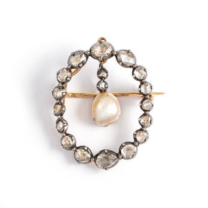 null 14K gold 585‰ and silver 2nd title 800‰ brooch, ovoid in shape, adorned at its...