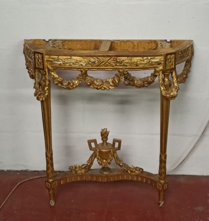 Half-moon console in gilded and carved wood...