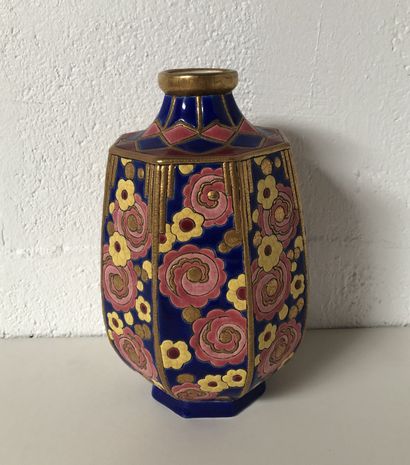 null LONGWY 

Earthenware vase with polychrome enamelled decoration of stylized flowers...