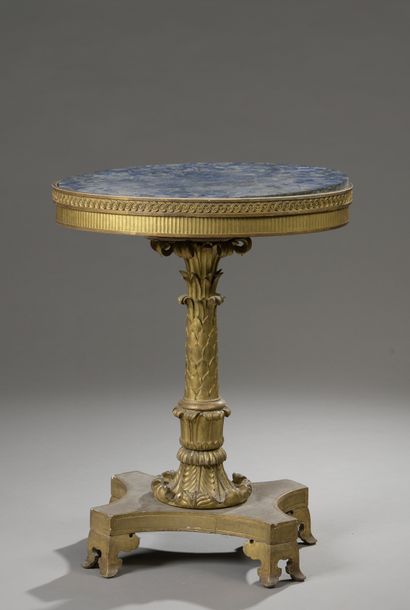 null Oval GUERIDON in gilded wood finely carved and gilded stucco. The shaft in the...