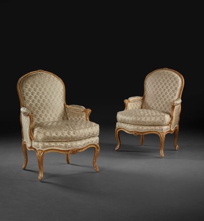 
Pair of bergères in carved and gilded wood...