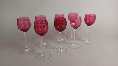 null Suite of 8 footed glasses in pink crystal with engraved decoration of a frieze...