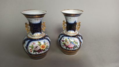 null BAYEUX

Two ovoid porcelain vases with handles and polychrome decoration of...