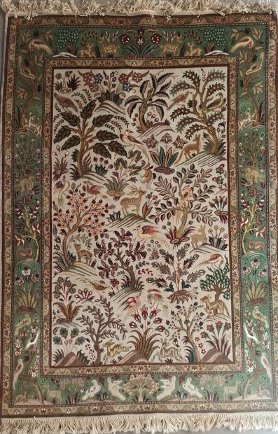 Persian carpet in wool and silk with decoration...