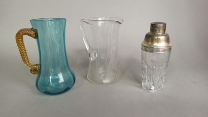 null Lot including 4 pourers, one Baccarat and one Saint-Louis. 

H. from 15 to 22...