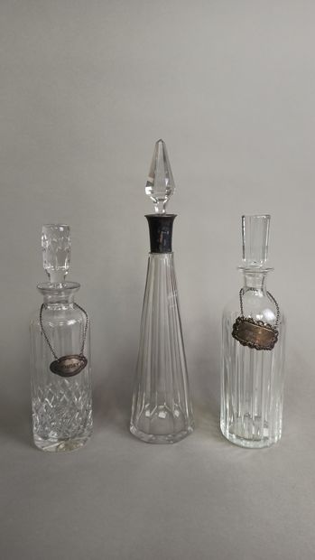 null Set including two crystal whiskey decanters, one Baccarat (marked on the back),...