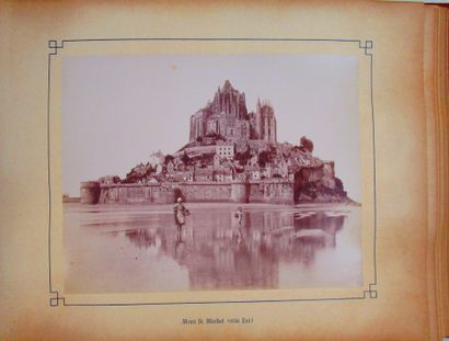 null Souvenir of the Mont Saint Michel. Photo album format in-folio oblong, red cardboard...