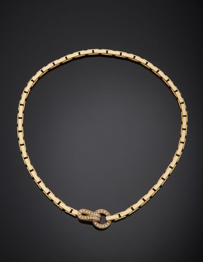 null CARTIER - Necklace in 18K yellow gold 750‰, Agrafe model, adorned at its center...