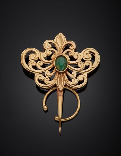 null Lot in 18K yellow gold 750‰ comprising a fibula adorned with a green stone (frosted...